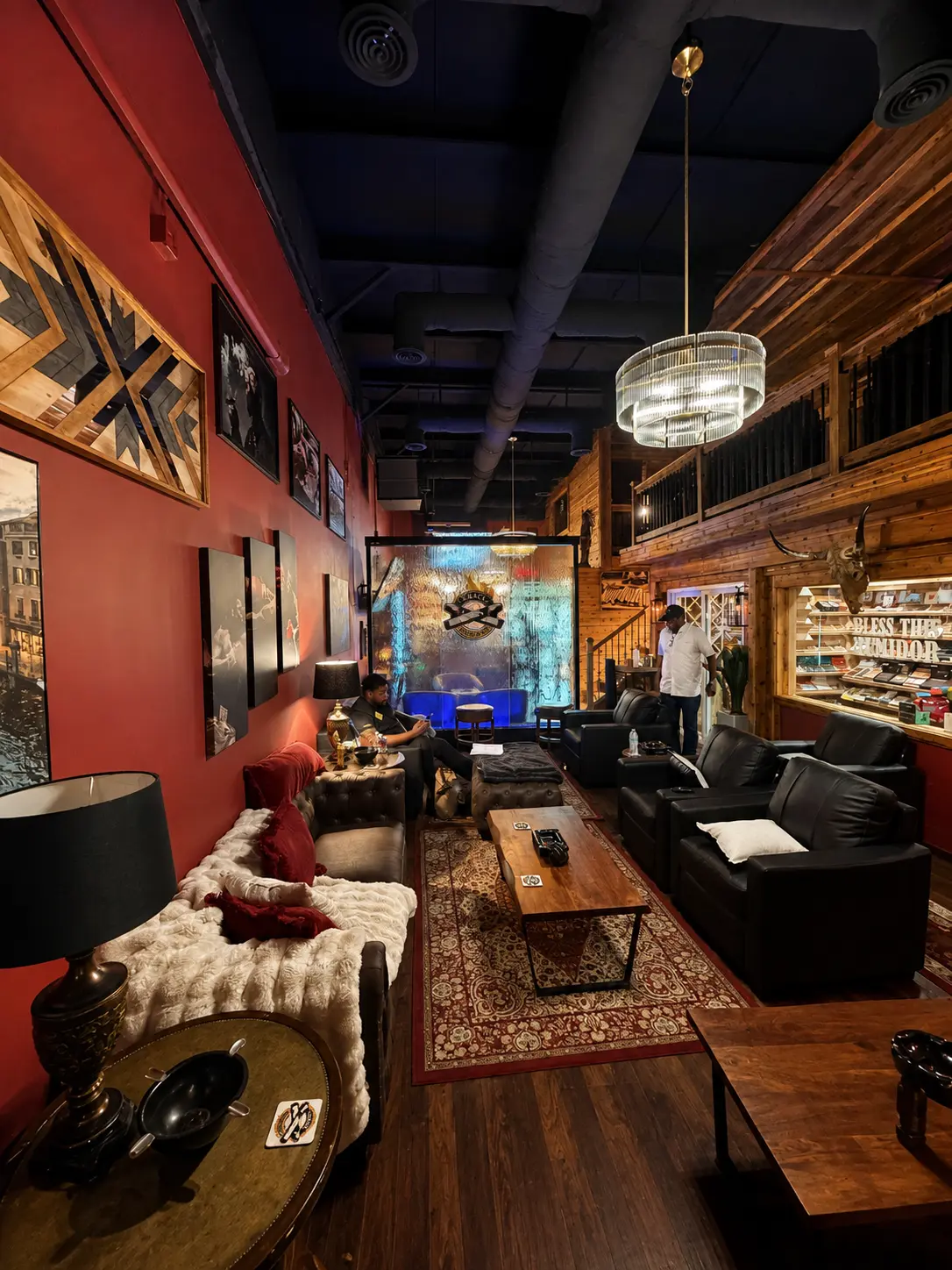 Wide view of the Legacy Lounge floor with chandelier and loft